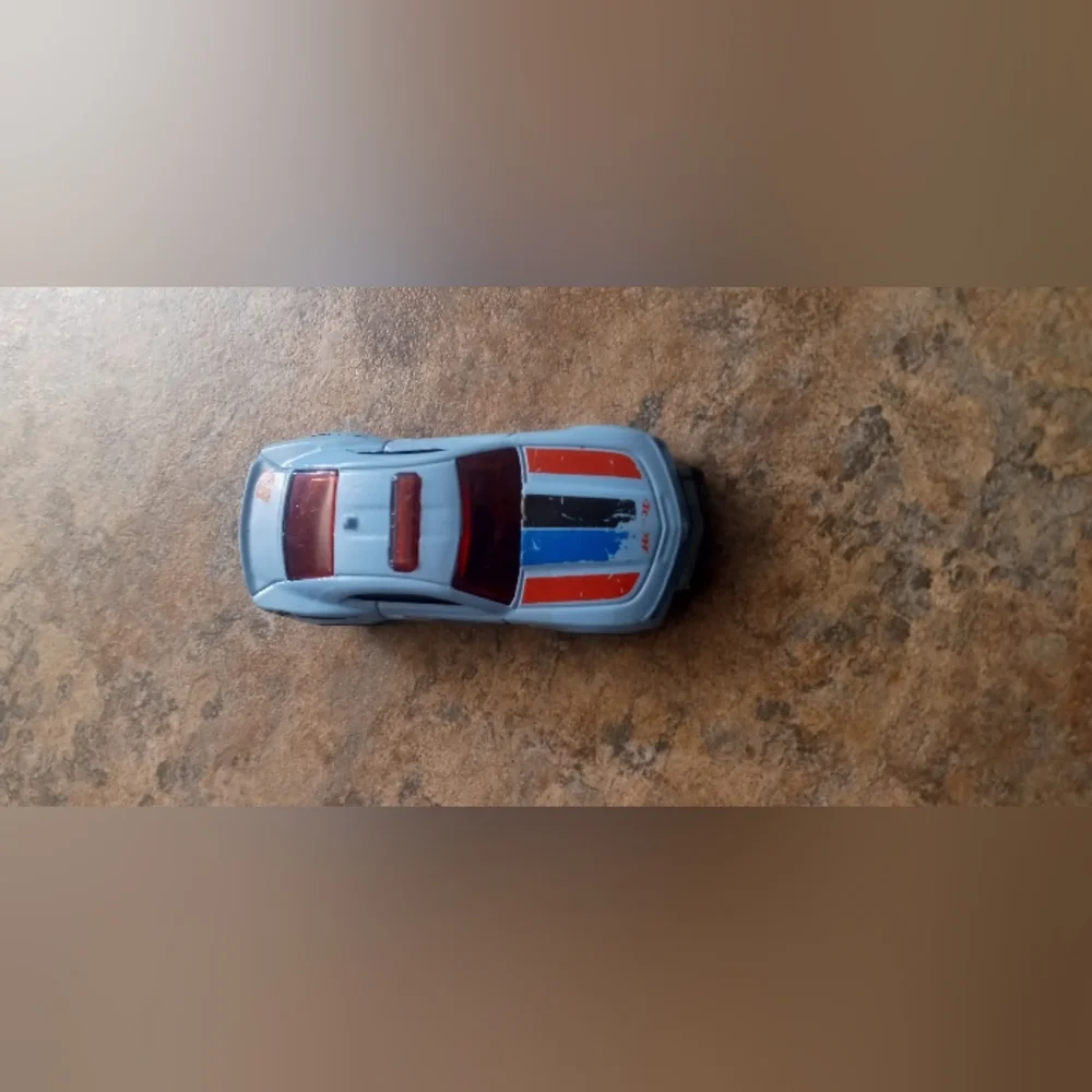 Light Blue Racing Toy Car with Red and Blue Stripes - Kids Toys